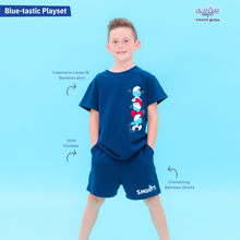 Load image into Gallery viewer, Child wearing a blue Smurfs-themed playset on a light blue background