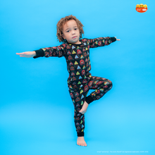 Load image into Gallery viewer, Child wearing a colorful onesie on a blue background